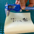 Close-up of high-quality natural latex sheet showing smooth 0.65mm thickness and bright white color for visibility | Armament Mfg.