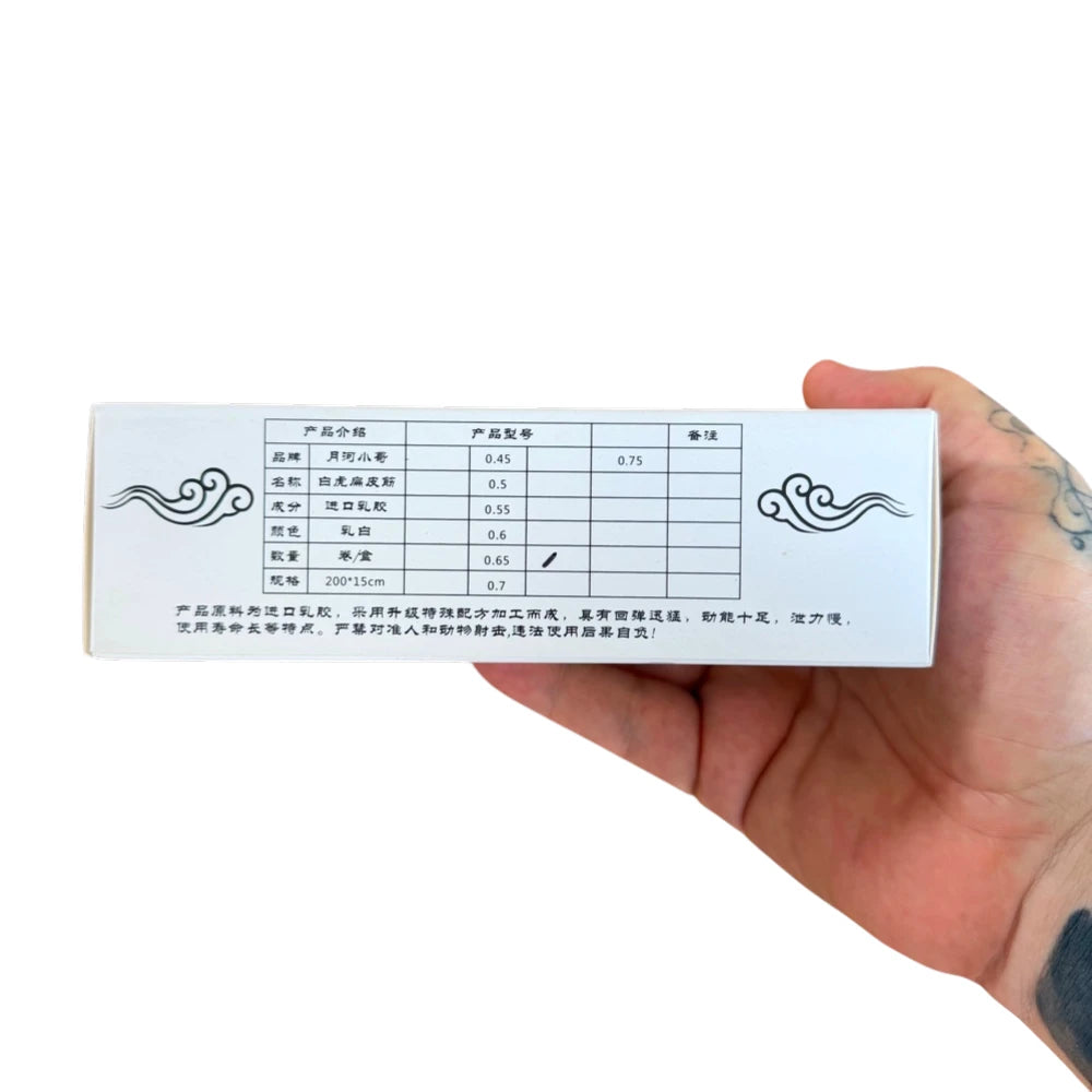 White 0.65mm ultra premium flat latex band roll 2 meters length 150mm width for DIY slingshot builds | Armament Mfg.