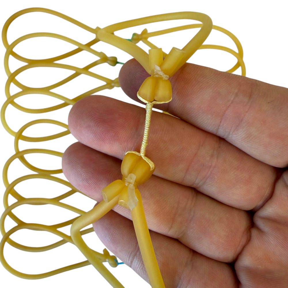 Close-up of high performance natural latex tube band showing bowstring design | Armament Mfg.