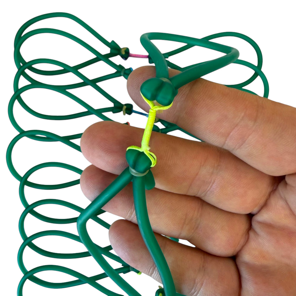 Close-up of super performance latex tube band showing bowstring integration | Armament Mfg.