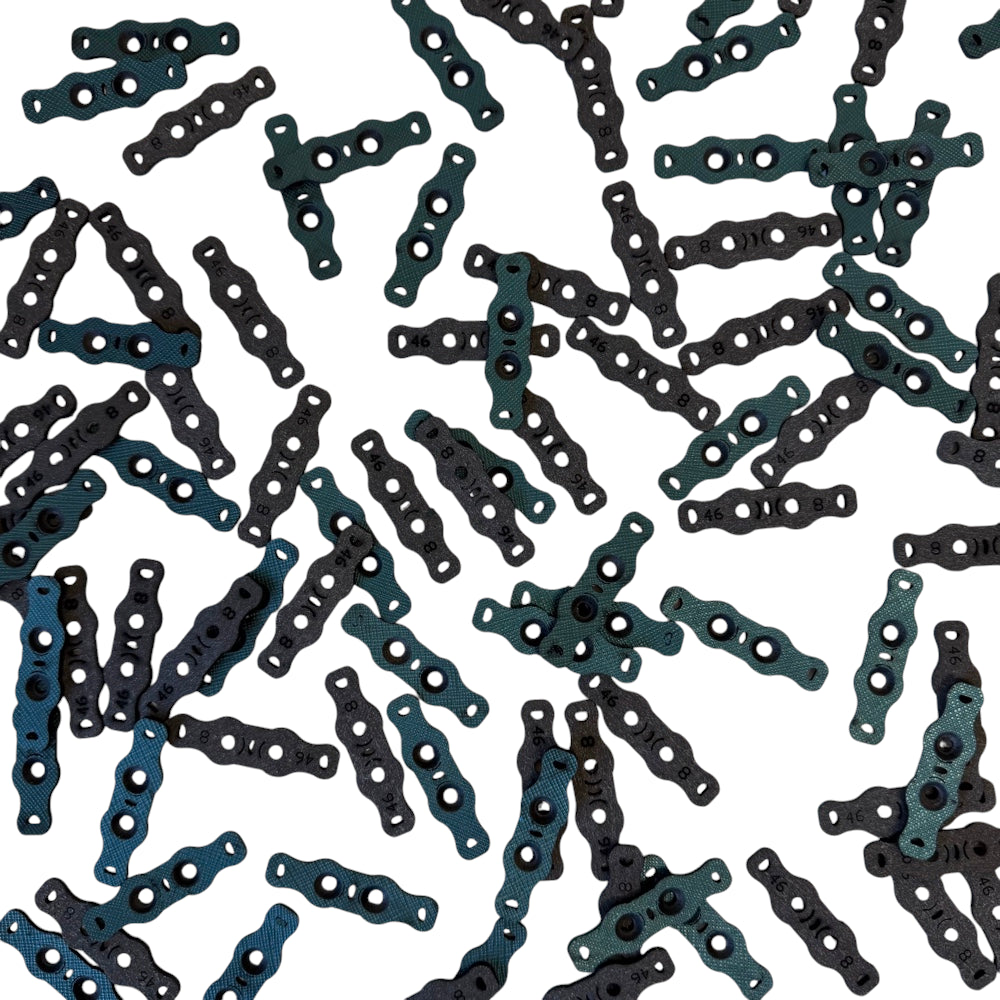 Blue and black 2mm anti-slip microfiber pit pouches 10 pack for secure slingshot ammo placement and control | Armament Mfg.