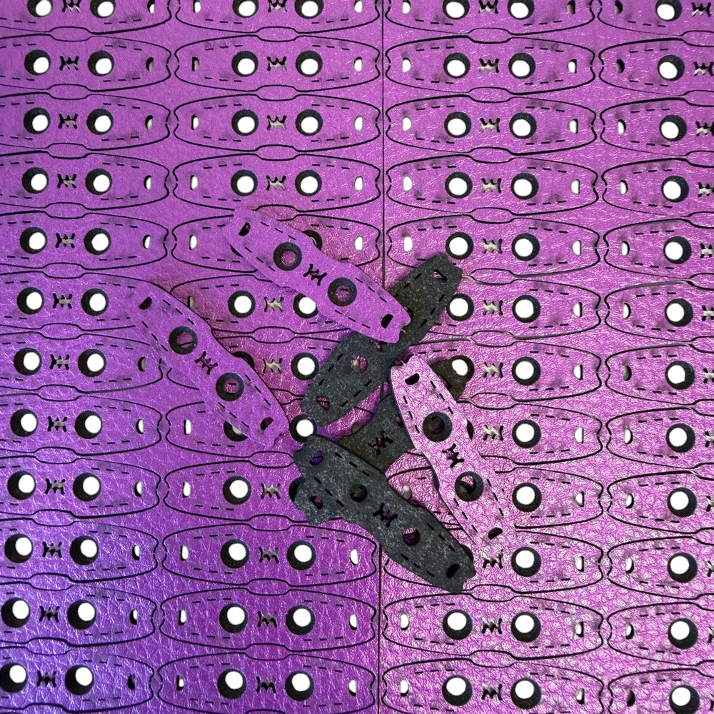Purple and black 2mm anti-slip microfiber pit pouches 10 pack for secure slingshot ammo placement | Armament Mfg.