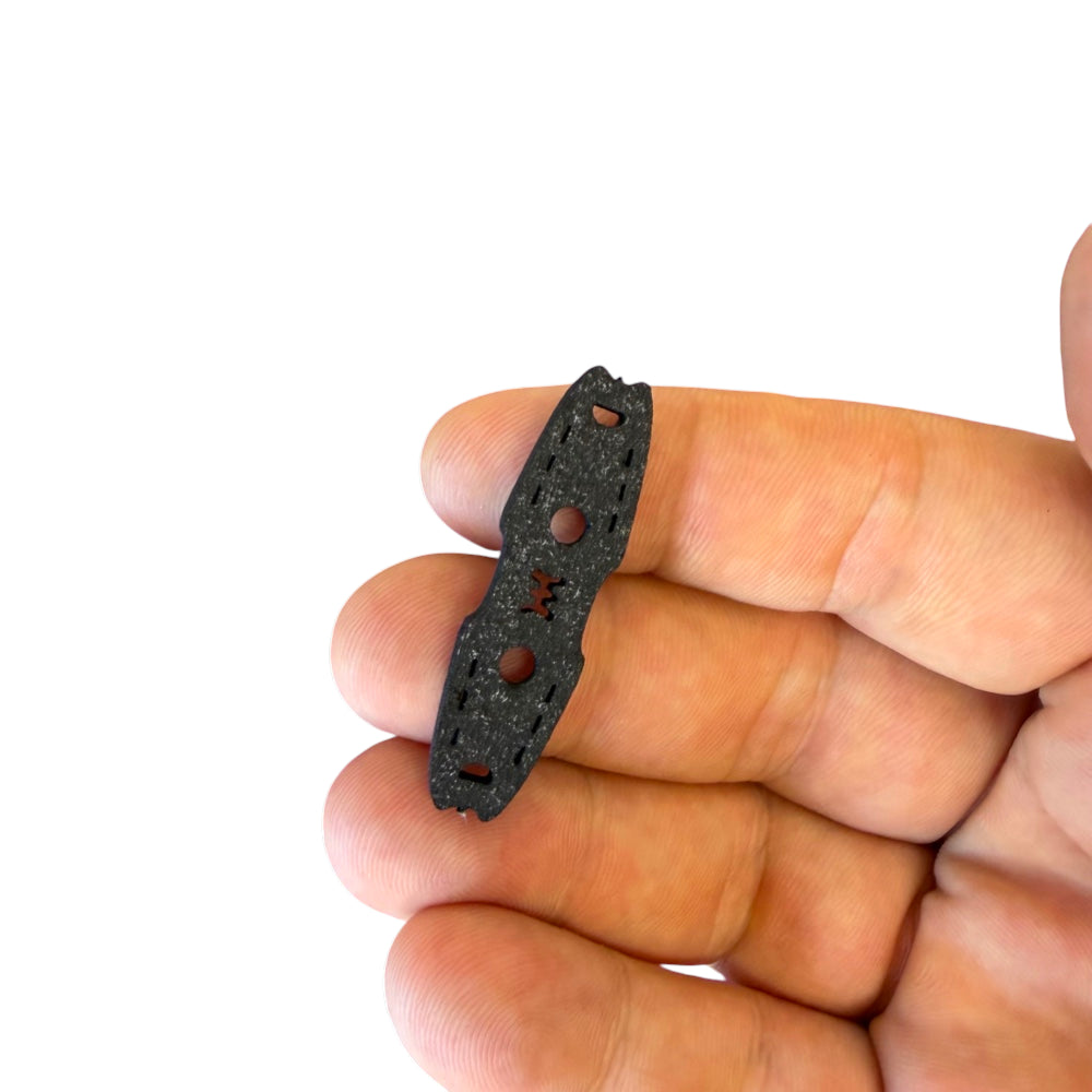 Detail view of 2mm thick microfiber slingshot pouch demonstrating secure ammo seating and smooth release | Armament Mfg.