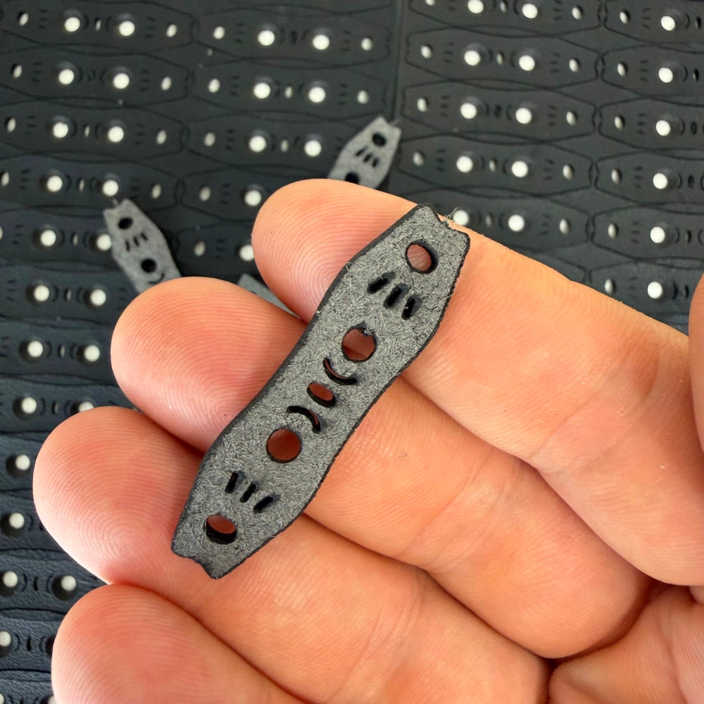 Detail view of 2mm thick microfiber pit pouch demonstrating secure grip surface for larger ammo | Armament Mfg.