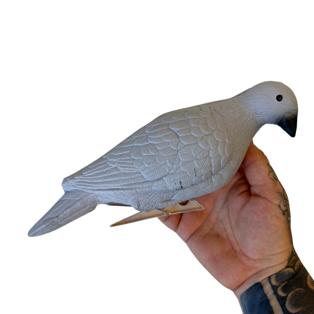 Close-up of high-density EVA foam pigeon target showing impact-absorbing construction for reusable precision training sessions | Armament Mfg.