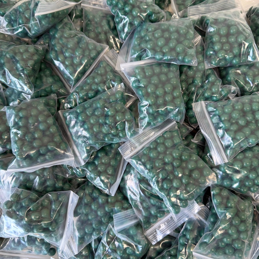 Green 9.5mm magnetic clay slingshot ammo pack of approximately 80 biodegradable pellets | Armament Mfg.