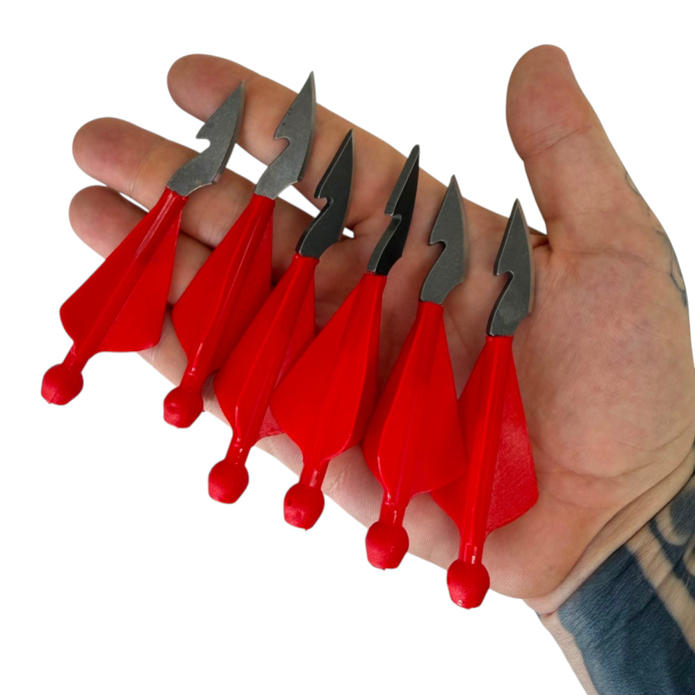 Six steel slingshot darts with stabilising tails arranged in a pack for precision shooting | Armament Mfg.