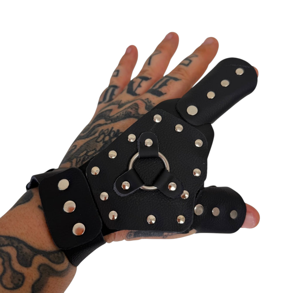 Close-up of steel-reinforced left hand dart shooting glove showing on-hand fit | Armament Mfg.