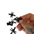 Detail of magnetic centering pouch with 9mm steel ball ammo showing automatic alignment capability | Amament Mfg.