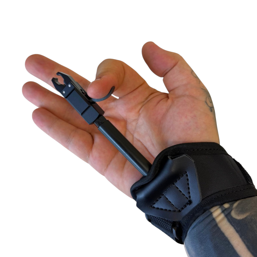 Close-up of archery release aid showing responsive trigger mechanism for consistent shot control | Armament Mfg.