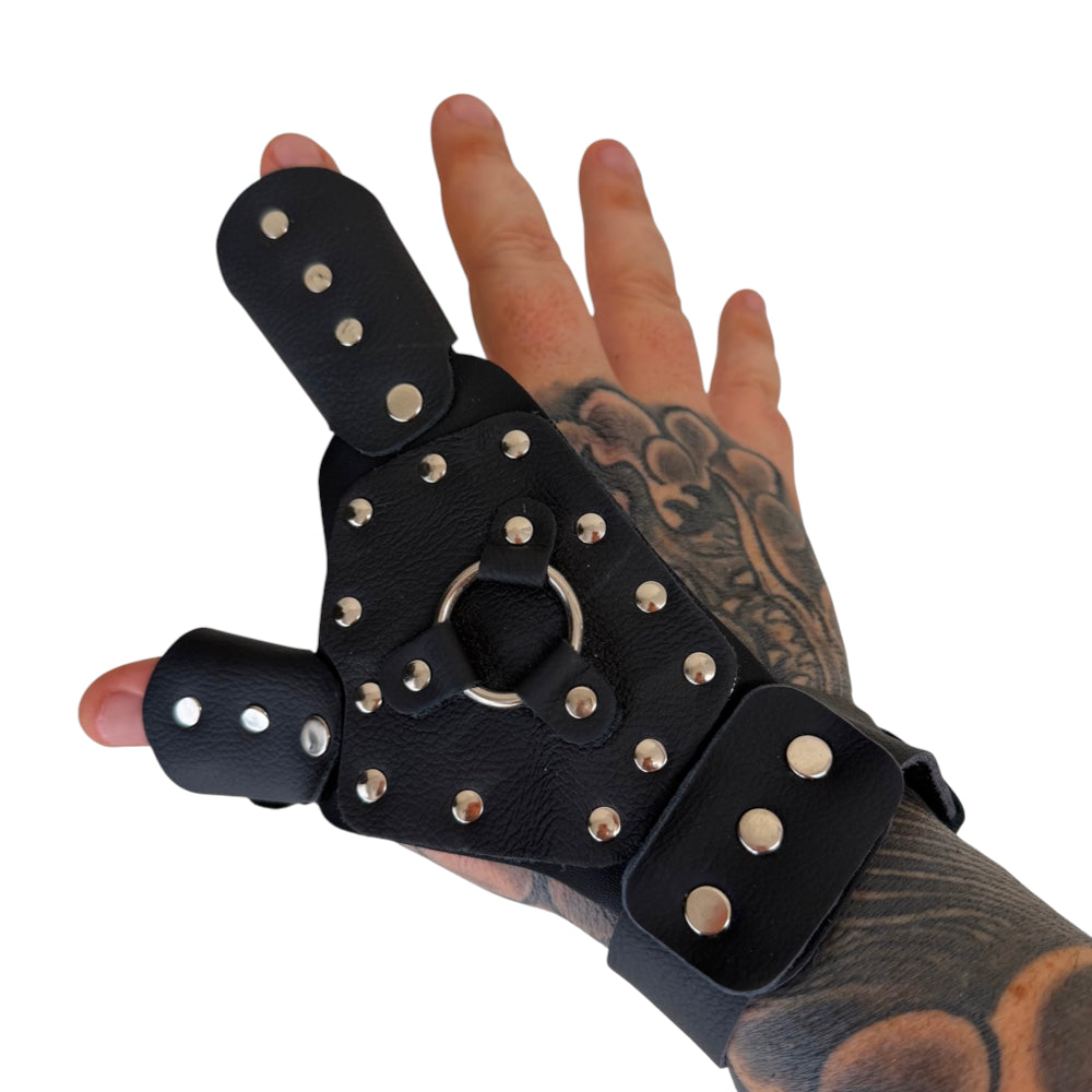 Close-up of steel-reinforced right hand dart shooting glove showing on-hand fit | Armament Mfg.