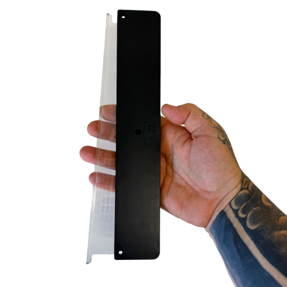 Tapered band cutting template demonstrating adjustable width settings for consistent slingshot band shaping | Armament Mfg.