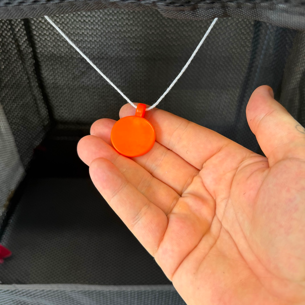 Slingshot target catchbox with orange spinner target | Armament Mfg.